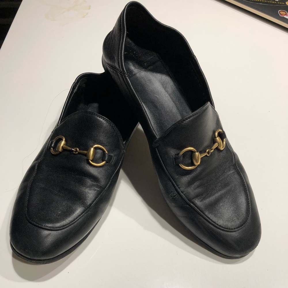 Black Gucci loafers